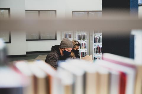 AUArts students studying in library with masks 