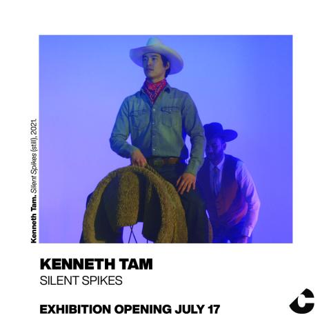 Two men dressed as cowboys are illuminated by dramatic blue and purple lighting. One, in a white hat and red bandana, sits atop a furry saddle, while the other stands behind him, partially obscured. Black text reads: “Kenneth Tam Silent Spikes, Exhibition Opening July 17.