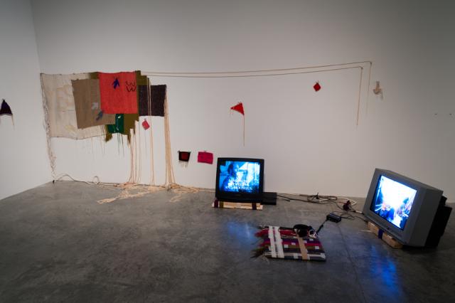 Wednesday Lypipciw's tapestry series My Sex Website (2014) along with BED OF INTIMACY (2014) documenting "the adventures of [the artists] imaginary sex dungeon".