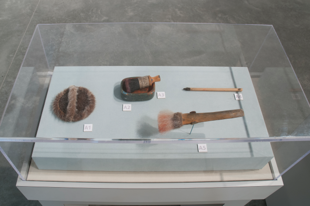 Four printmaking tools. Mostly brushes.