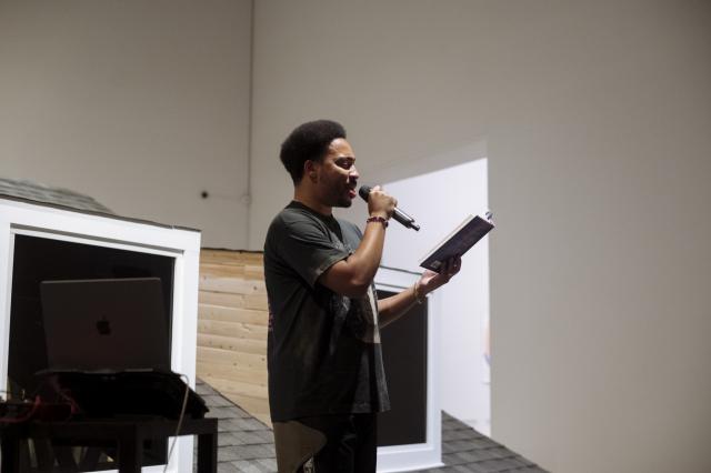 Rollie Pemberton reading from his book, "Bedroom Rapper". Photo credit Elyse Bouvier.