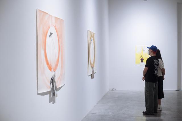 Heather Hart. Northern Oracle, Gallery attendees viewing the water colours. Photo Credit Elyse Bouvier. 