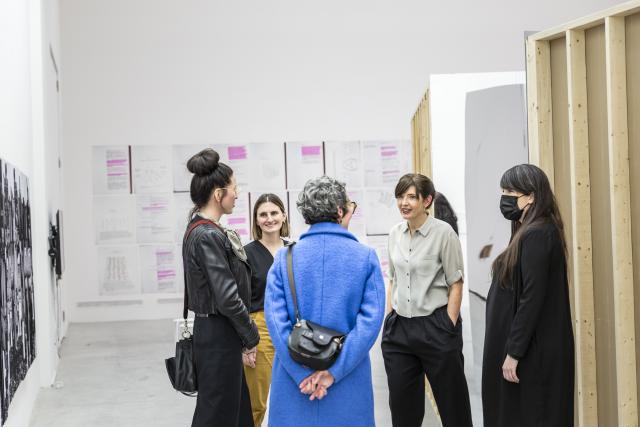 Guests chat with artist Annie MacDonell and curator Leila Timmins